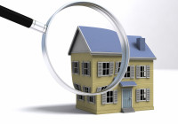 A magnifying glass examining a house. 3D render with HDRI lighting and raytraced textures.